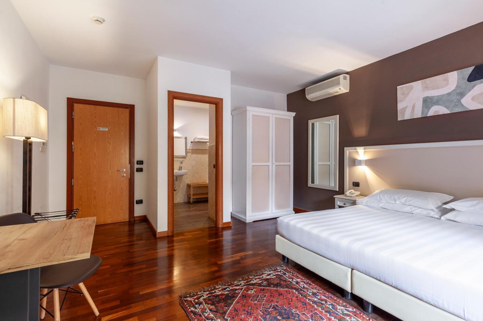 Inn Rome Rooms & Suites — Foto 1